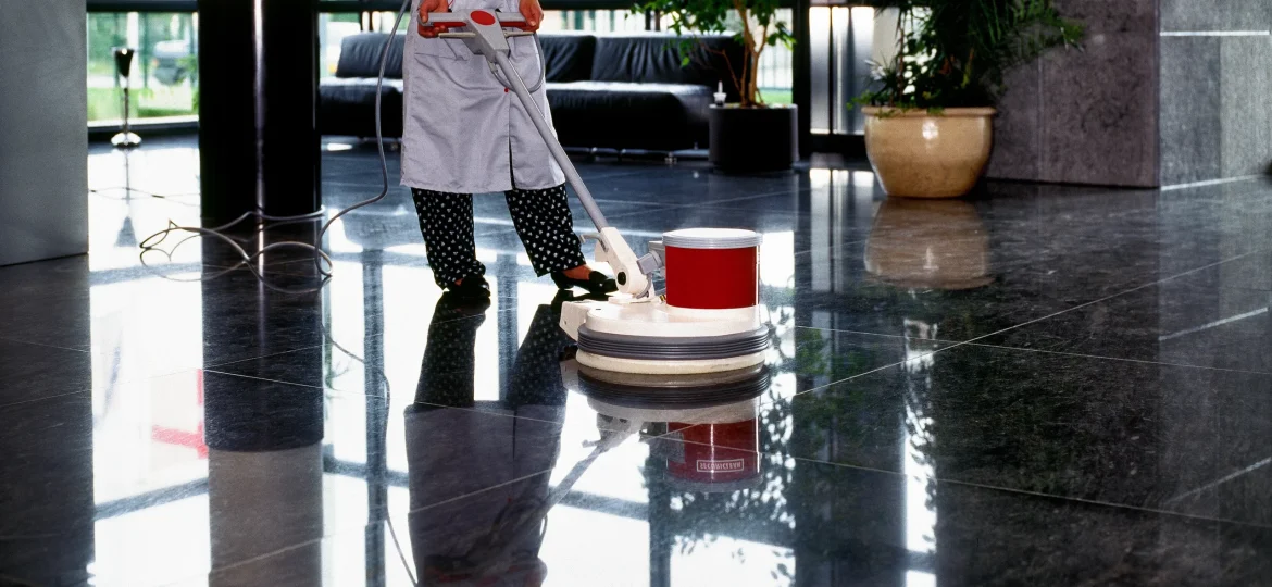Professional marble floor cleaning and polishing in a commercial building