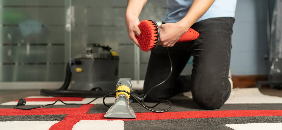 Professional office carpet cleaning using specialist equipment in a commercial workplace